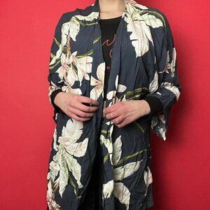 Navy blue kimono style cover up covered in floral Lilly pattern​​​​​​​​​​​​​​​
